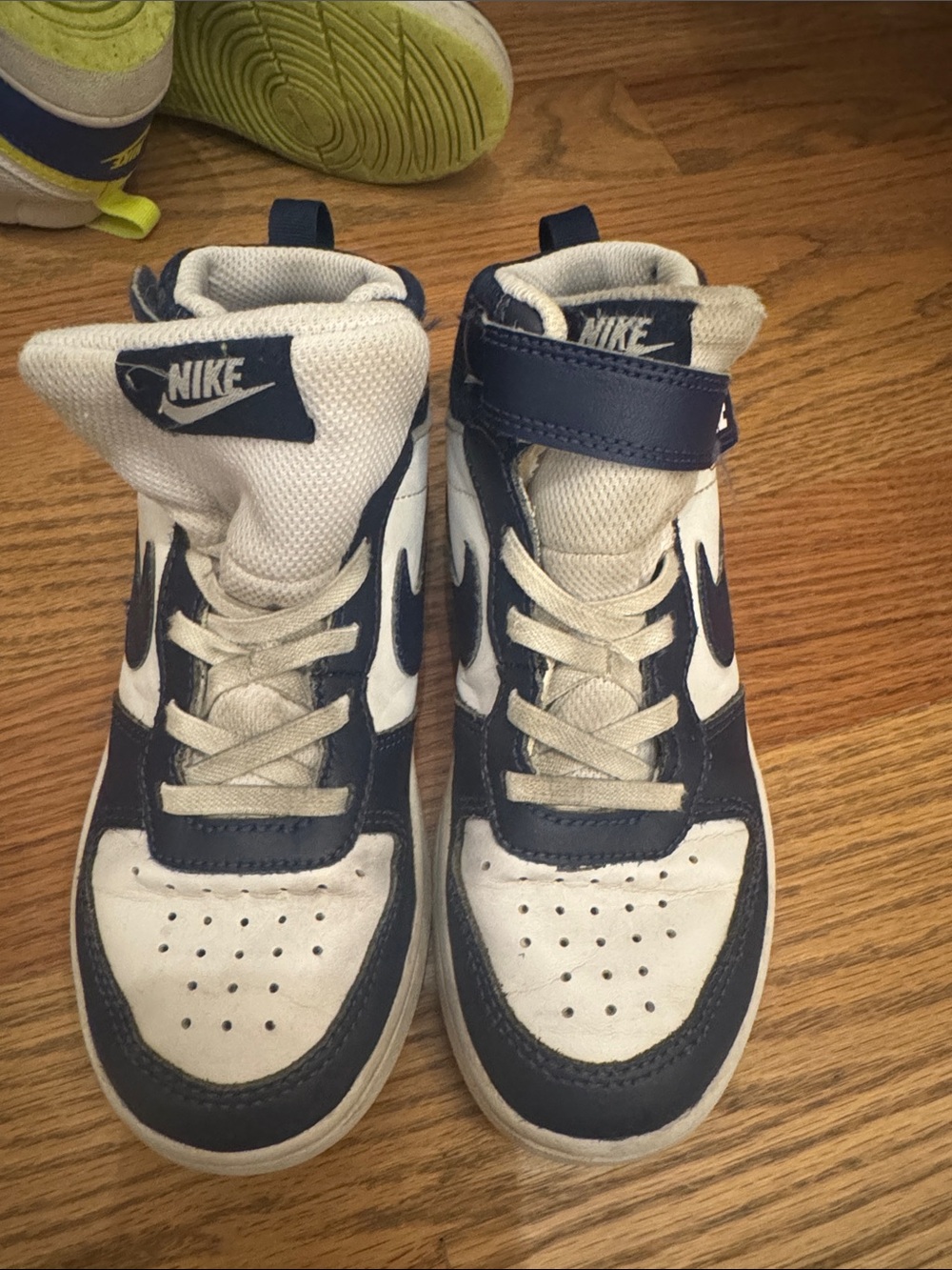 Nike Kids High-Top Sneakers in White and Navy Blue